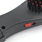 Detailed view of the electric hair massager comb's ergonomic design.