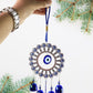 Blue metallic bells on Om Evil Eye decorative wind chime