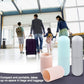 Hand holding a blue Konvex travel toothbrush holder, showcasing its portable design.