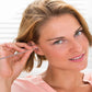 Compact keychain holder securely storing the ear cleaning tools for on-the-go hygiene.