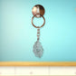 Elegant laser-cut peacock feather keychain accessory