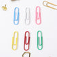 Close-up of multicolor office paper clips holding papers securely