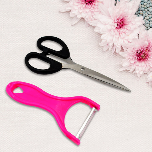 Close-up of the sharp blades on the stainless steel kitchen scissor.