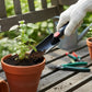 Compact gardening trowel suitable for pots and beds