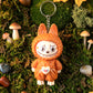 Face changing cartoon toy keychain with attached keyring