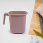 Four square bath mugs in transparent mixed colors, stacked neatly.