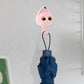 Side profile of the creative wink cat adhesive coat hook showing its sturdy build.