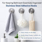 A sturdy stainless steel hook perfectly installed on bathroom tiles, ideal for towels.