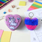 Heart shaped keyring combo featuring plush keychain and storage box