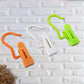 Multipurpose hanging hook clip clipping onto fabric with firm grip
