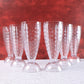 Milkshake glass highlighting footed base and diamond-cut crystal texture