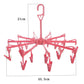 Drying rack with blue clips for underwear and bras, designed for optimal airflow.