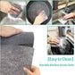 Microfiber dish cloth being rinsed under running water for easy cleaning.