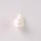 White hand wall clip neatly holding a set of keys
