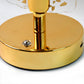 Warm LED light glowing through butterfly design crystal lamp shade