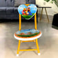 The compact folded state of the children's chair, highlighting its easy storage.