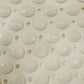 Flexible anti-slip bath mat folded to show versatility and easy storage
