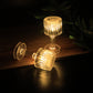 Warm glowing LED crystal-effect table lamps used for festive and event décor