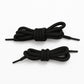 Several colourful polyester shoelaces laid out flat, highlighting the mixed color options.