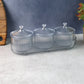 Single snack storage jar from dry fruit storage set on kitchen surface
