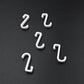 Multi-angle view of the strong self-adhesive plastic hook, highlighting its sleek design.