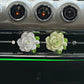 Close-up flower petal details on floral car air freshener clip