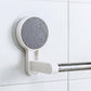 Self-adhesive towel rod mounted on a white clean wall