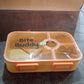 Compact leak-proof lunch box with utensil storage for travel