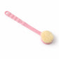 Close-up view of the gentle, exfoliating bristles on the Velvet Wipe back scrubber.