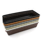 Plastic storage bins used as kitchen drawer dividers for cutlery and utensils.