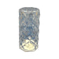 A single Crystal LED Candle casting a soft glow, ideal for bedroom or living room decor.