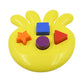 A child happily engaging with the Octo Shape Sorter Toy, learning through interactive play.