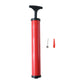 A hand firmly gripping the lightweight plastic ball pump, ready for use.