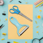 Multipurpose kitchen scissor demonstrating its various functions like bottle opener.