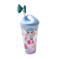 Ergonomic Unicorn Water Bottle held by a child, showing its travel-friendly size.