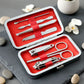 Complete manicure and pedicure grooming kit showing all stainless steel tools