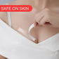 Woman applying anti-skid transparent fashion tape for a perfect fit.