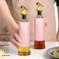 Multiple Vastate glass cruet bottles neatly arranged, showcasing their uniform design for storing different liquids.
