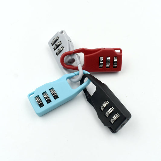Close-up of the numbers on the secure 3-digit luggage lock.