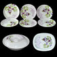 Complete 32-piece plastic dinnerware set, including plates and utensils.