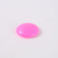 Set of pink plastic tack board magnet buttons displayed