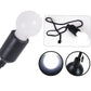Close-up of the black LED bulb, showing its pull cord mechanism.
