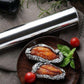 Aluminum foil roll, heavy duty and non-stick, ideal for wrapping.