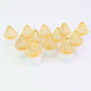 Golden net covered LED flameless candles emitting warm white light for home decor