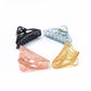 Plastic triangle claw clip in translucent colors for hair styling
