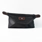 Travel shoulder bag in stylish black waterproof fabric for grooming kits