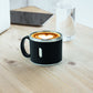 Six Apex stainless steel desk mugs stacked neatly on counter