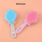 Close-up of a cartoon hair brush, demonstrating its flexible bristles for a comfortable scalp massage.