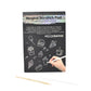 Child drawing detailed doodle on colorful scratch art sheet
