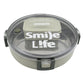 An adult holding the sleek Miracle Stainless Steel Lunch Box, ideal for office or school lunches.